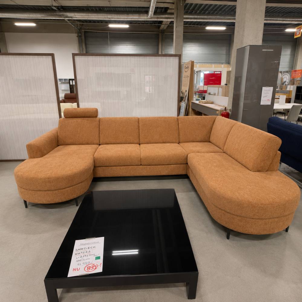 Henders & Hazel Alcona hoekbank in koperkleurige Vada-stof met ottoman rechts, outletmodel voor de Magazijnverkoop XXL in Sint-Gillis-Waas